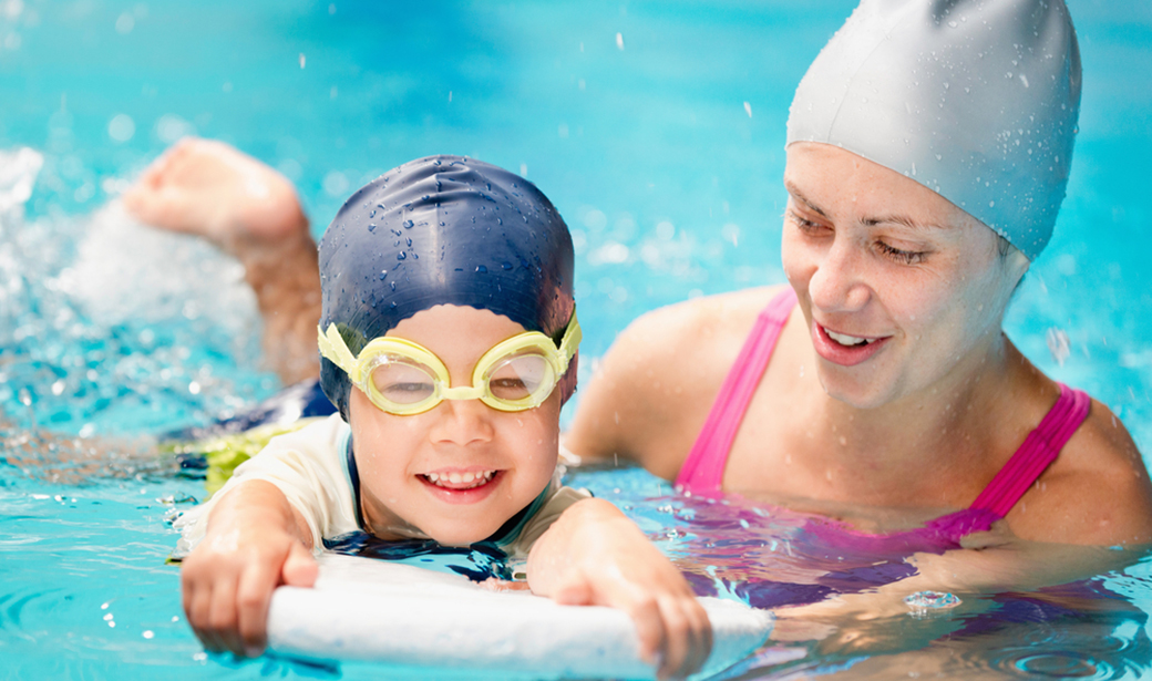 child at swimming lessons