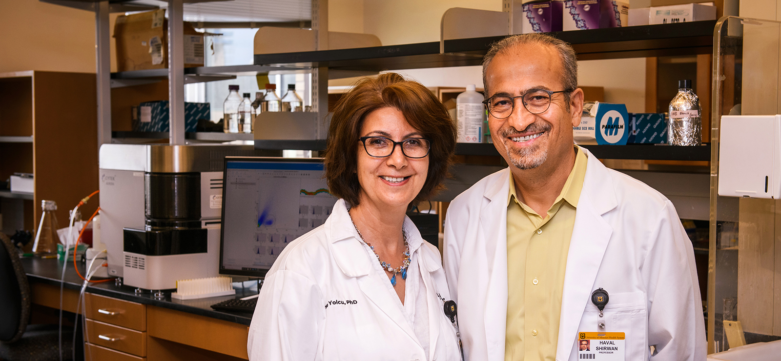 Dr. Shirwan and Dr. Yolcu in a research lab