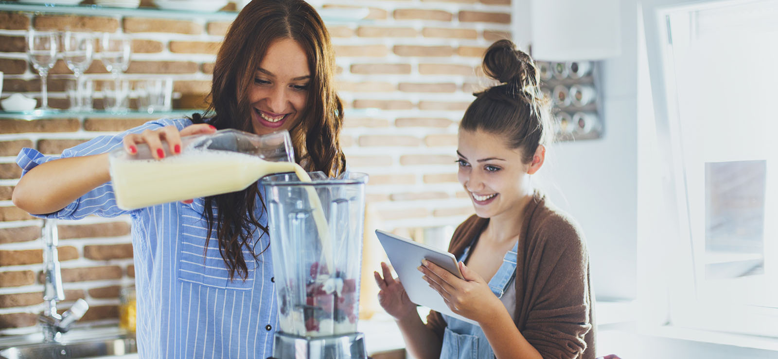 women coooking with a blender