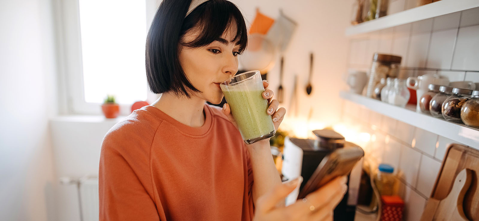 woman drinking a smoothy