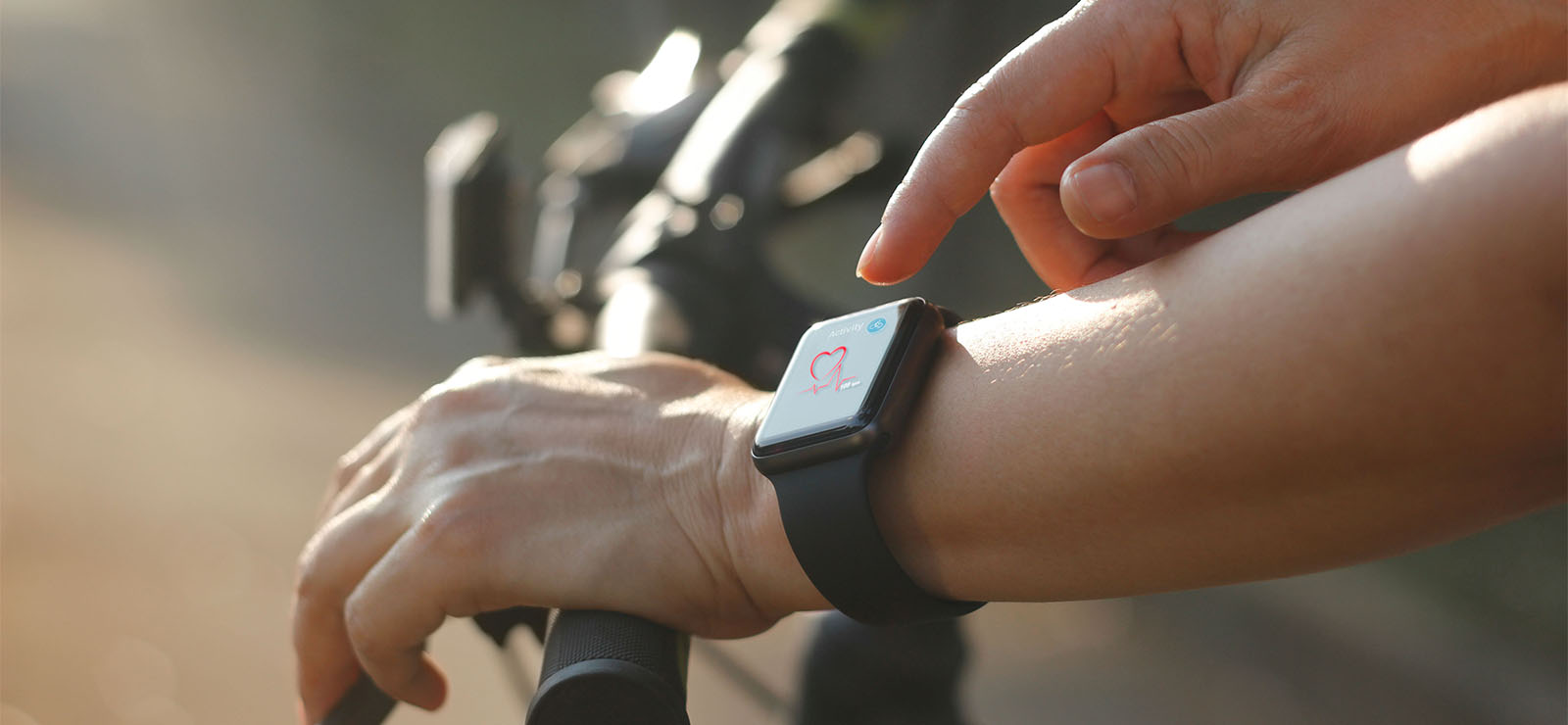 Person monitoring their heart rate on their watch