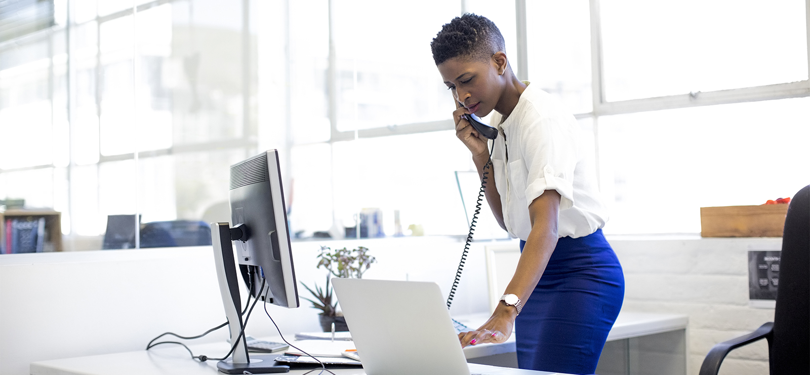 woman standing while working