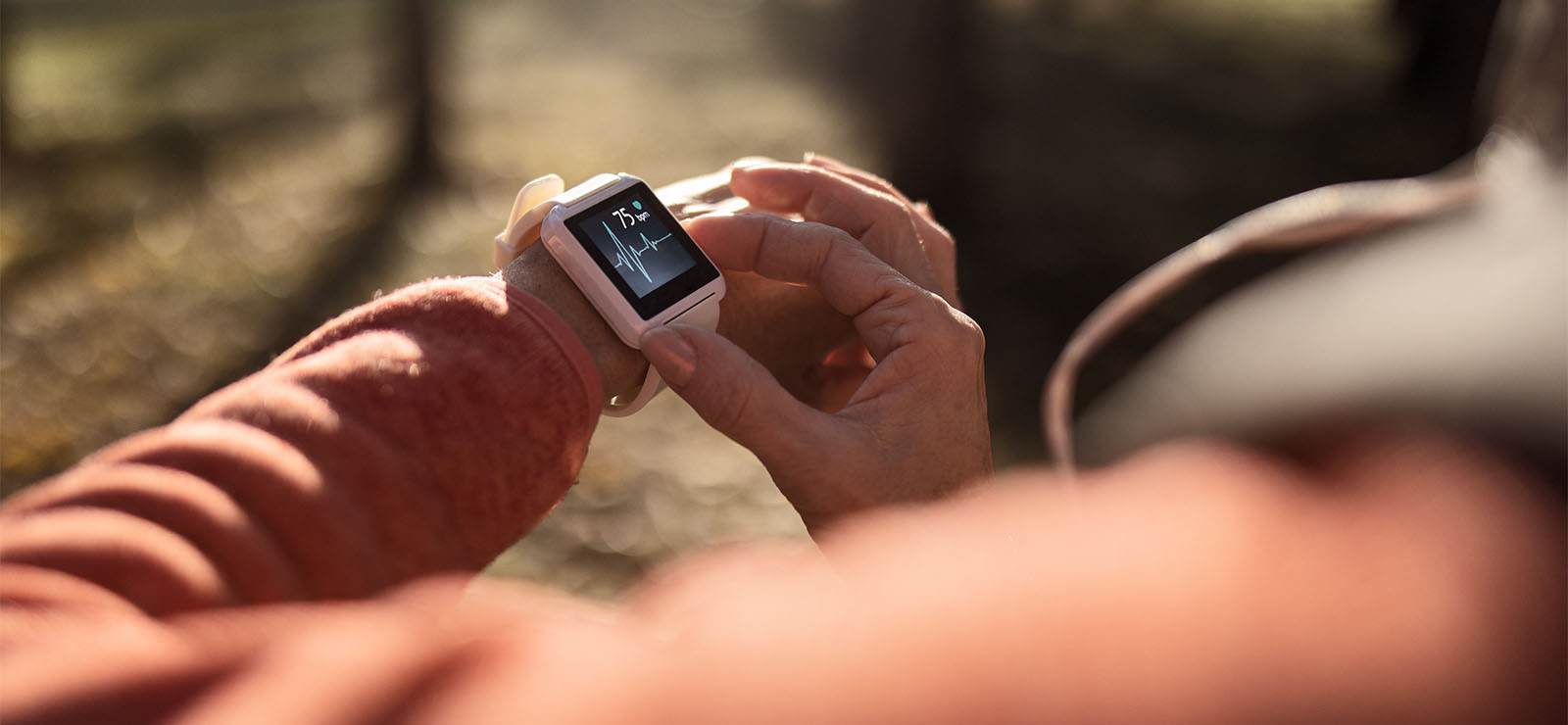 A person wearing a smart watch.