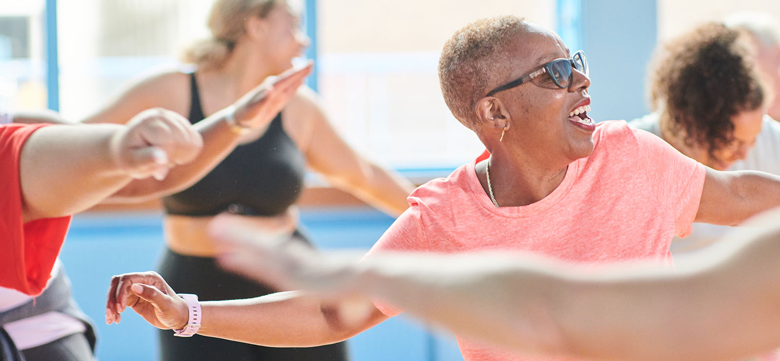 A photo of a group of women exercising.