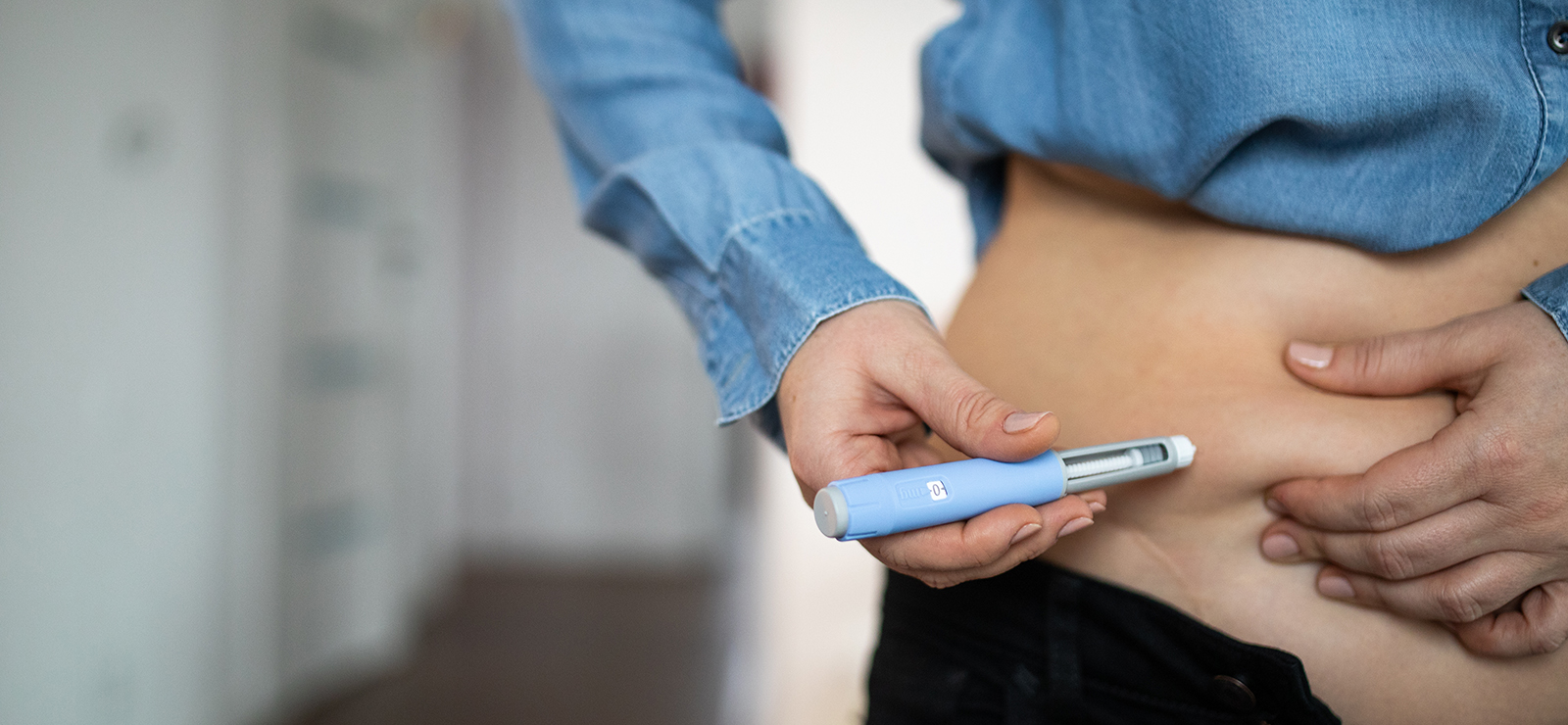 A photo of a person using medicine.