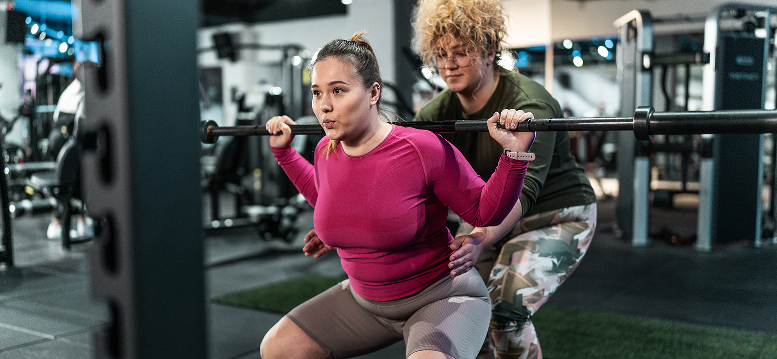 Two women weightlifting