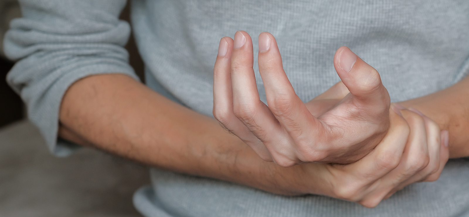 A person dealing with achy hands