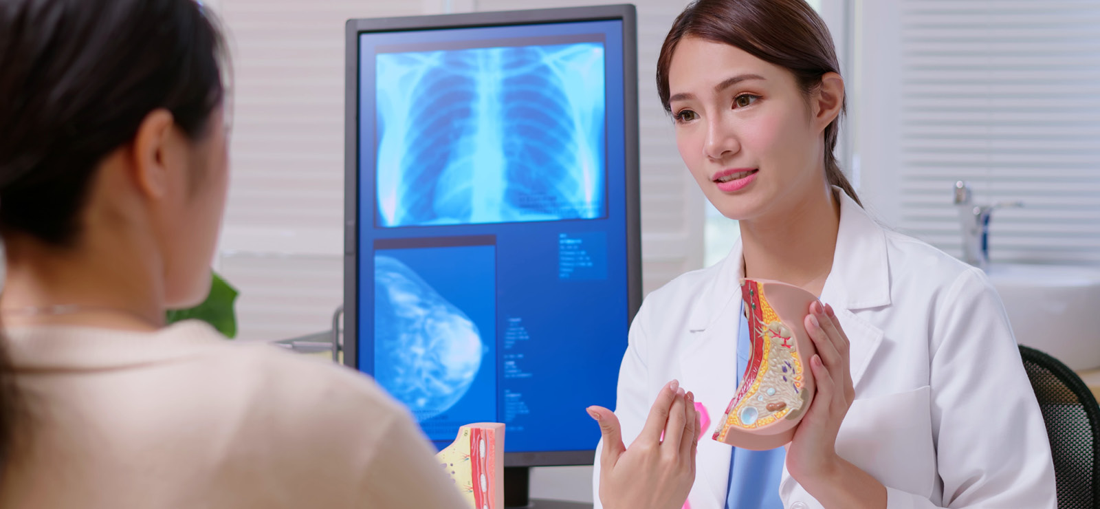 A physician speaking with a patient.