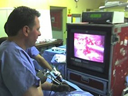Dr. Hoernschemeyer practicing a thoracoscopic technique in 2004.