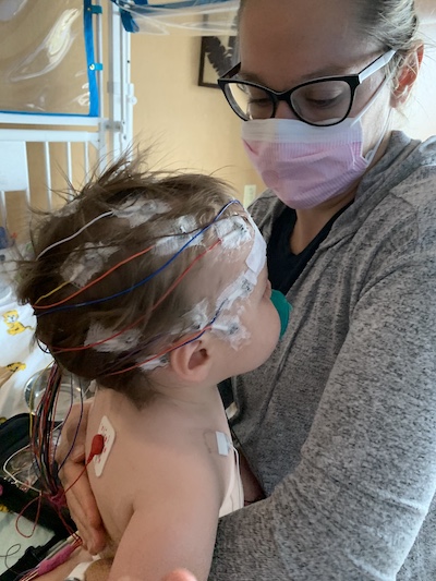 Amanda and her son after the EEG electrodes were placed