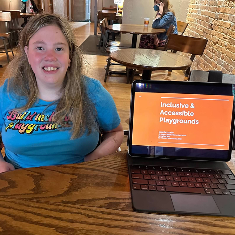 Child displays a slideshow presentation.