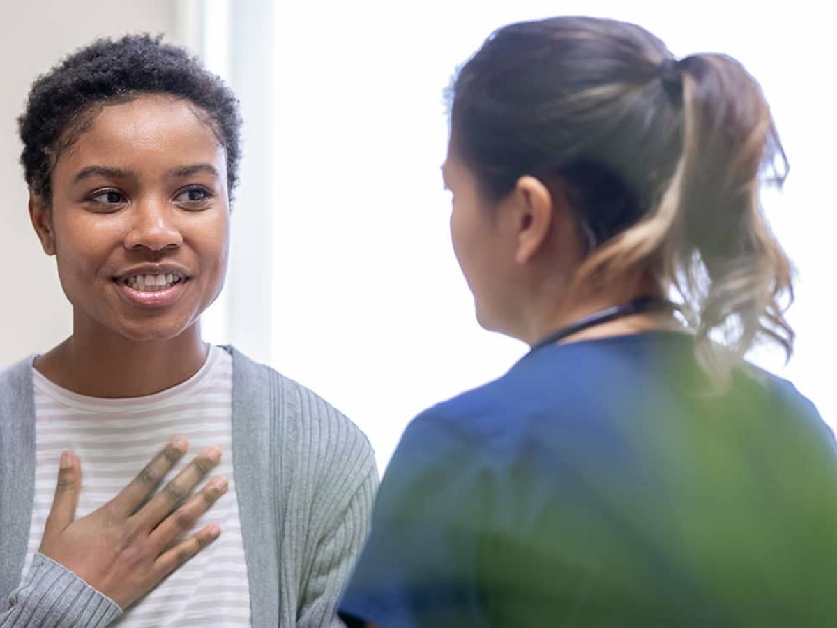 Milennial woman talking with a doctor