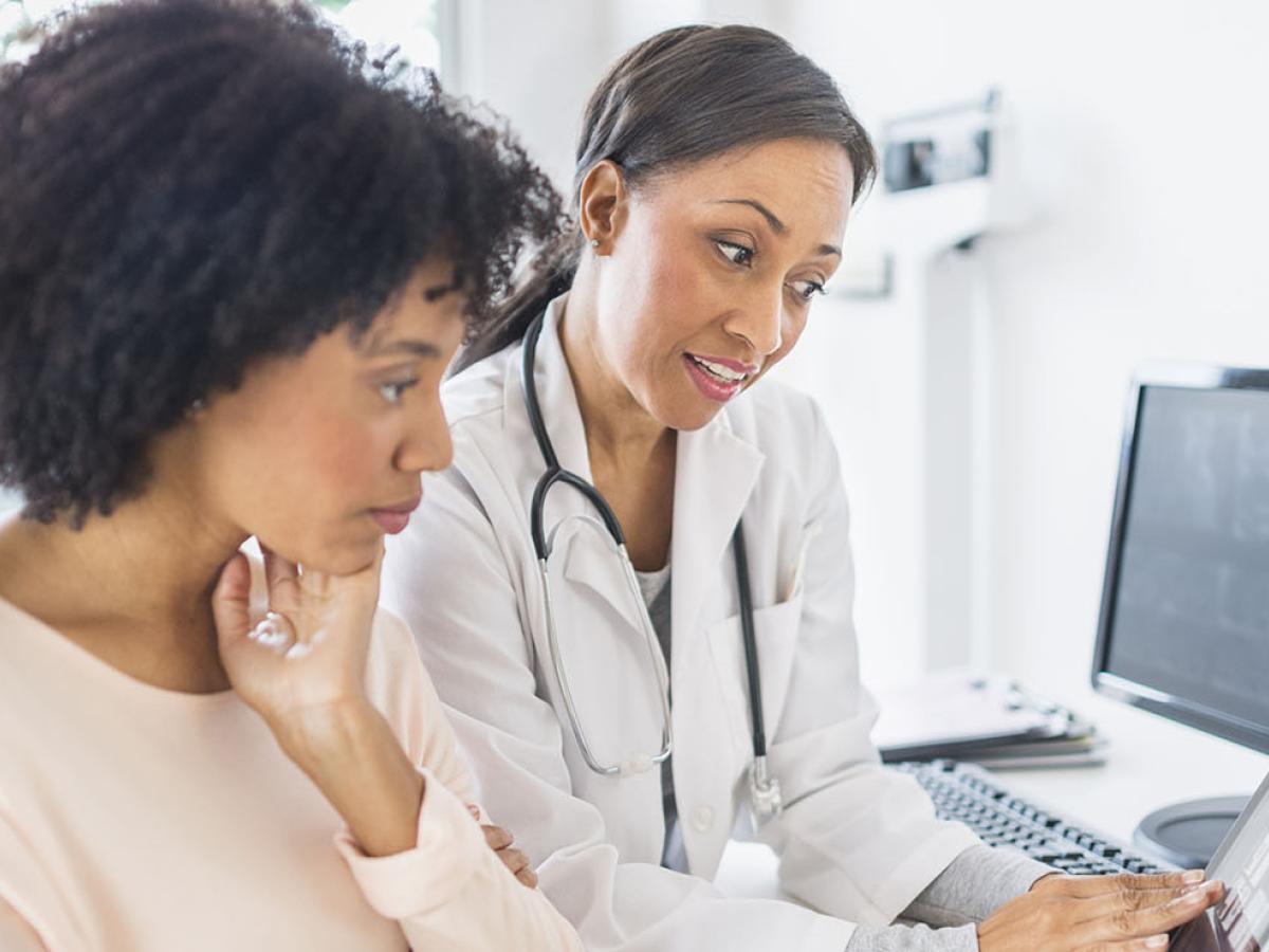 female doctor with female patient