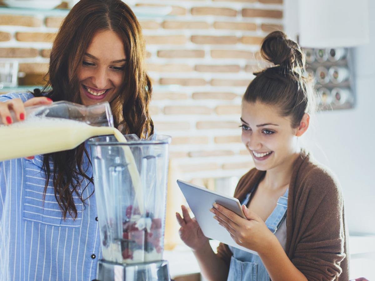 women coooking with a blender