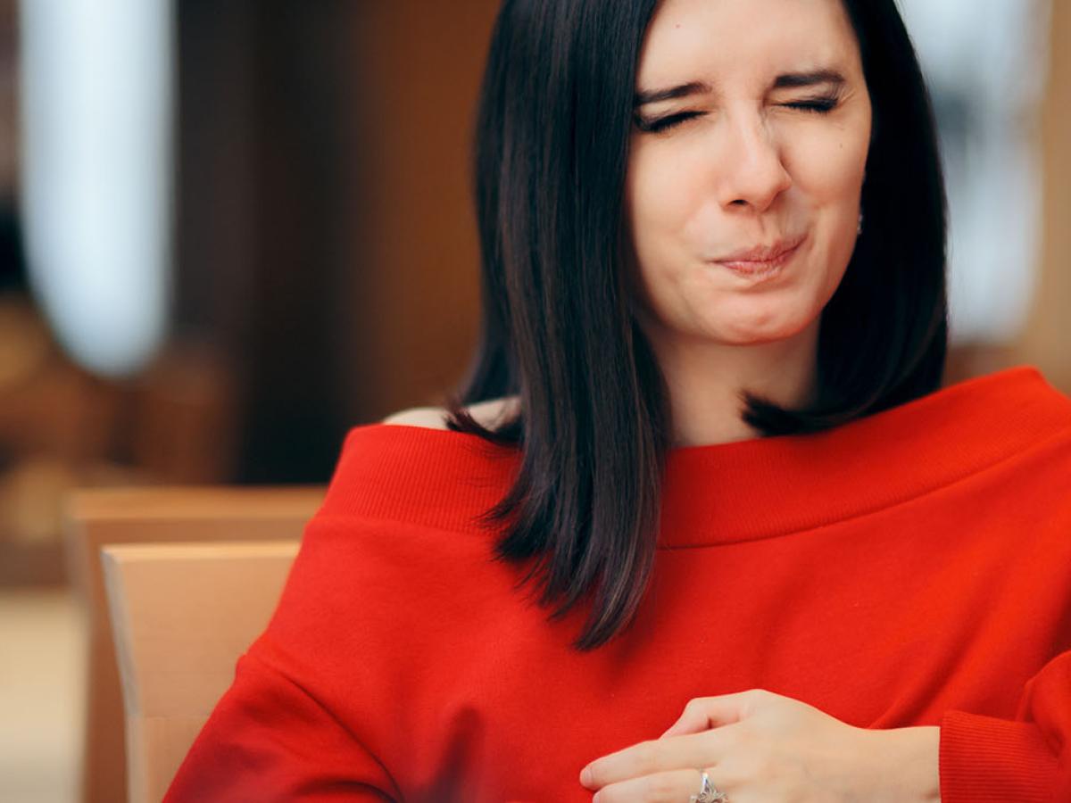 woman with heartburn