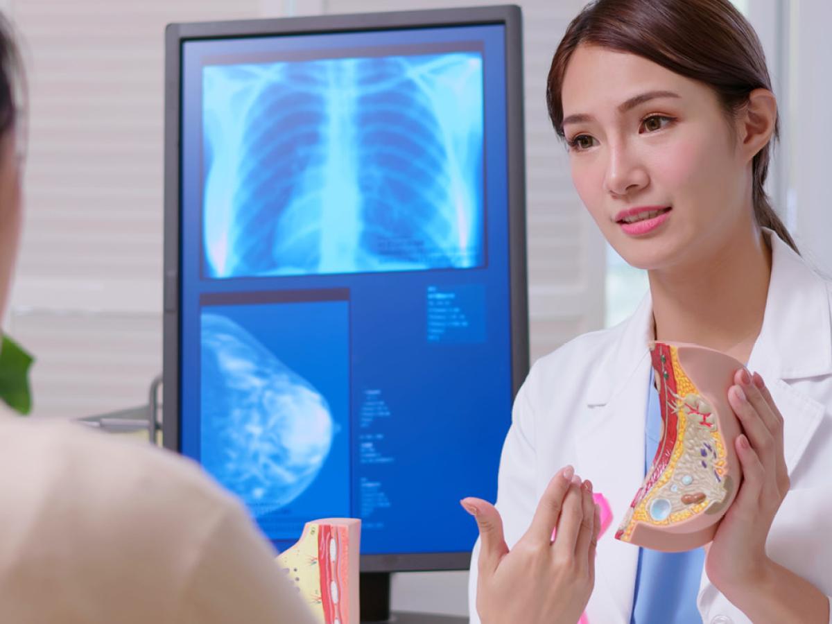 A physician speaking with a patient.