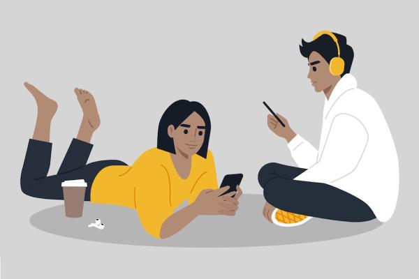 A graphic of two people staring at cellphones.
