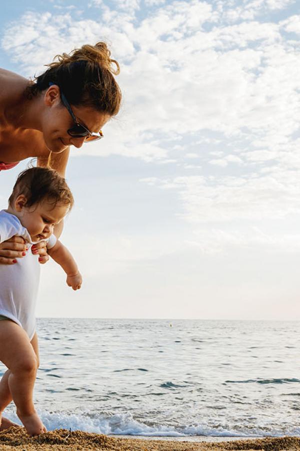 mother and child on the beach