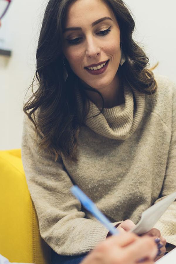 A woman speaking with a physician.