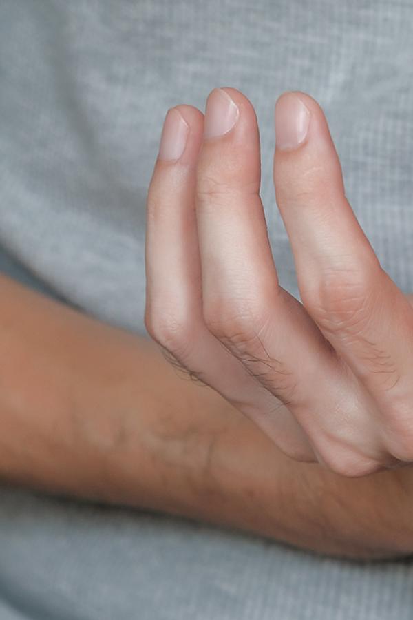 A person dealing with achy hands