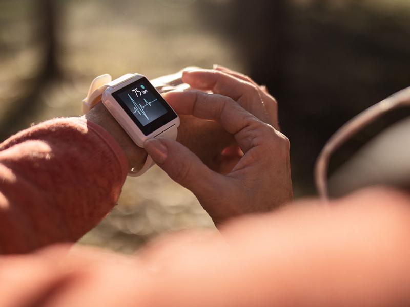 A person using a smart watch.